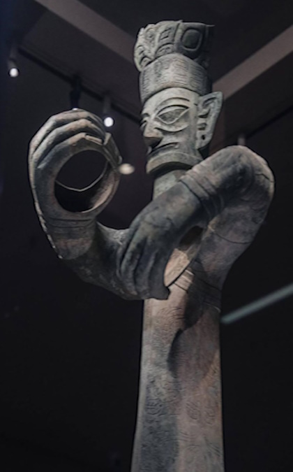 :Large Bronze Standing Figure. (Collection of the Sanxingdui Museum)