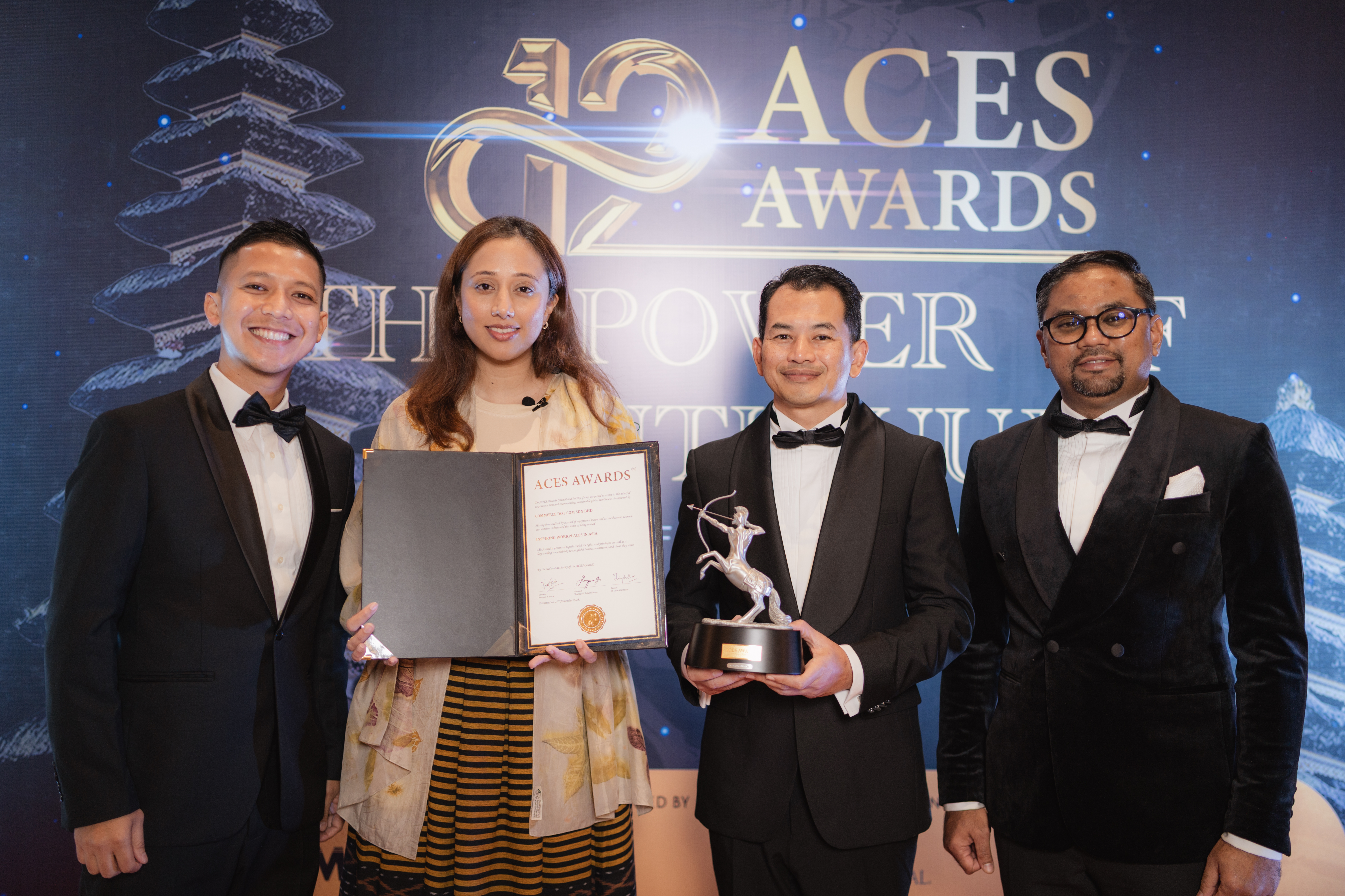 Second from left, Putri Nurul Ida Yahya, with En. Hafidz Ahmad Zehnun and the CDC delegation, receiving the “Inspiring Workplaces in Asia” award at the ACES Awards 2025 in Bali.