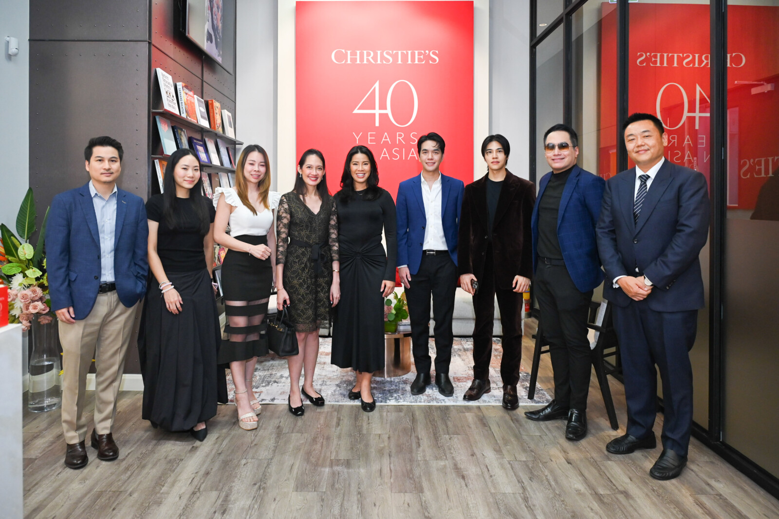 Melissa Chollasap (4th from left), Managing Director of Porsche Design Tower Bangkok, and Prapavadee Sophonpanich (5th from left), Senior Vice President, Managing Director of Christie