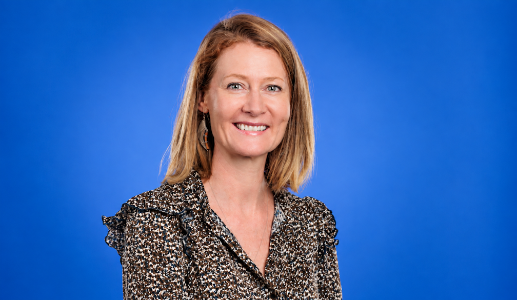 Warm Corporate Portrait on Blue