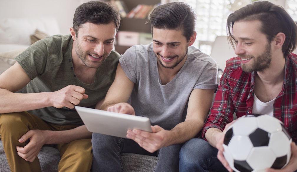 men-watching-tablet